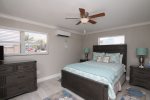 Dorm Style Guest Bedroom with 1 Full and 1 Twin Bed